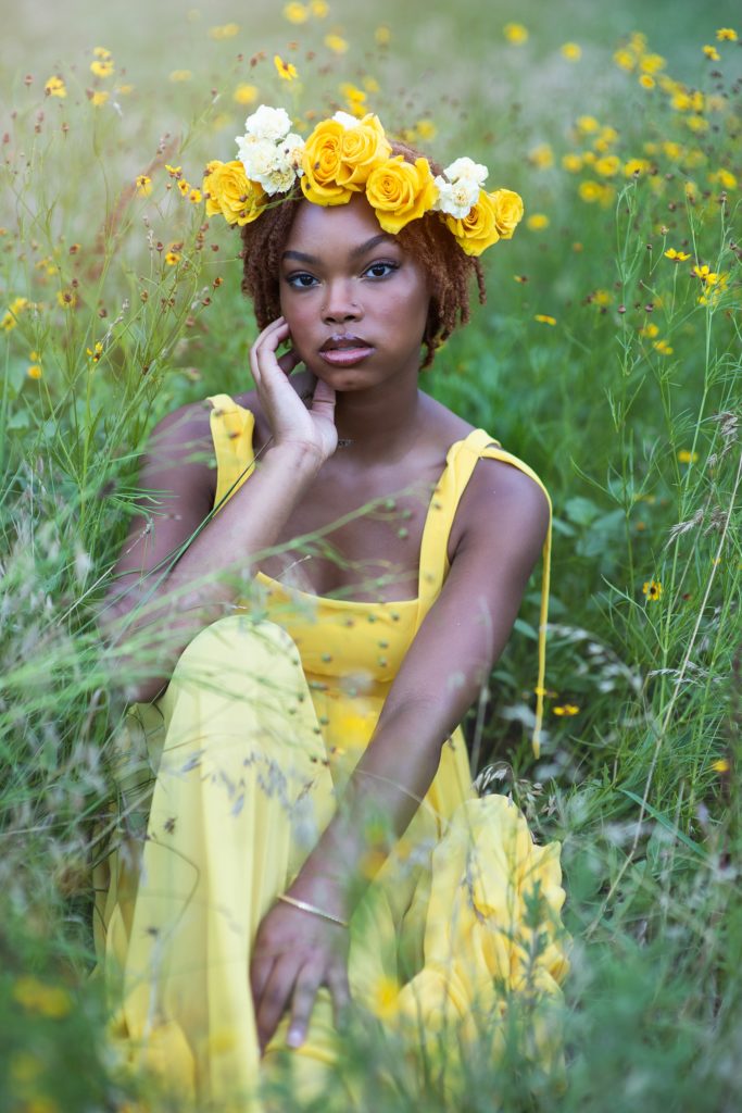 Wichita, KS senior portraits girl in flower field flower crown
