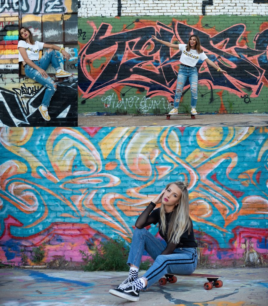 high school senior girls on skateboard in front of graffiti wall