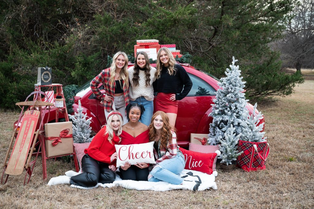 Christmas themed photoshoot with teenage girls and red vw bug