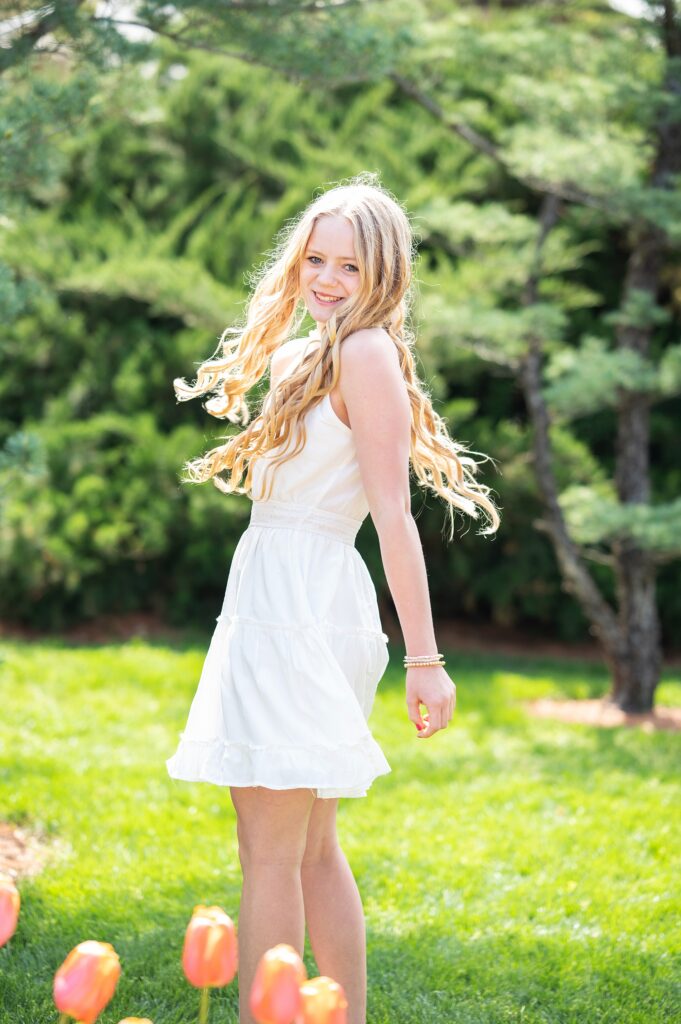 girl in white dress photoshoot spring