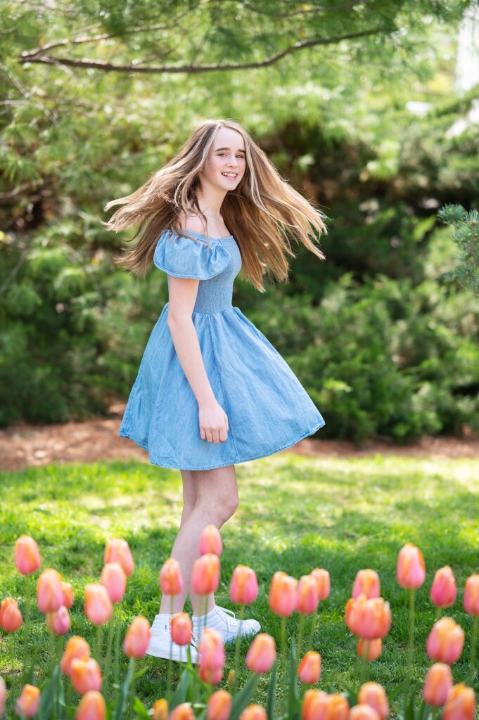 teen girl photoshoot wearing blue dress in natural setting