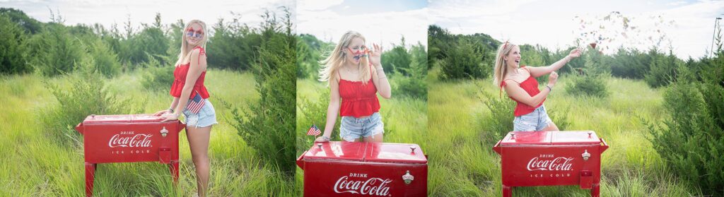 Fourth of July themed photoshoot high school senior Wichita, KS in field with confetti popper and fourth of july themed outfit